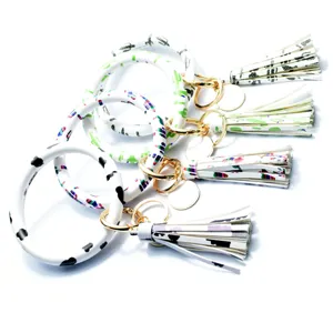 Portachiavi bracciale in pelle PU con nappina braccialetto moda donna accessorio