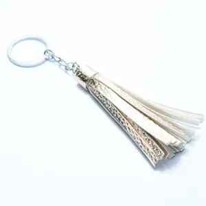 Golden leather tassel keychain with silver ring bag charm accessory pendant for women