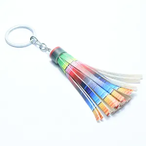Colorful leather tassel keychain detail shot, perfect bag pendant and stylish keyring accessory.