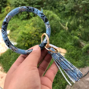 Portachiavi con bracciale in pelle stampata serpente blu con nappa da donna moda