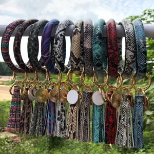 Portachiavi con Nappa in Pelle PU Bracciale Anello Rotondo Pendente Moda Accessori per Borsa Polsino Portachiavi Regalo Per Donne