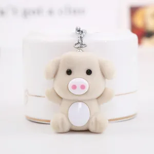 Cute plush little pig keychain with metal ring, soft animal toy charm backpack pendant.