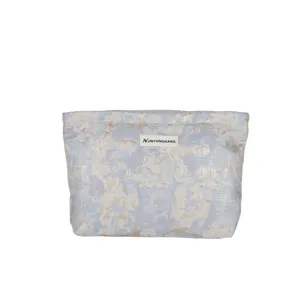 Elegante Brokat-Clutch für Damen, schicke Abendtasche mit Blumenmuster und tragbare Kosmetiktasche.