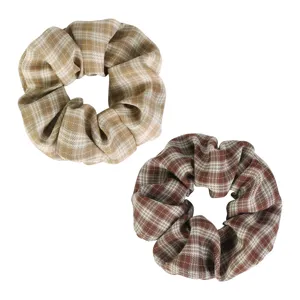 Plaid fabric hair scrunchies detail view, high elasticity rubber band for casual daily use.