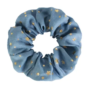 Blue fabric hair scrunchie with gold star pattern, cute vintage hair tie for women girls.