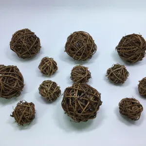 Natural vine rattan balls detail closeup, rustic texture floral decorative spheres.