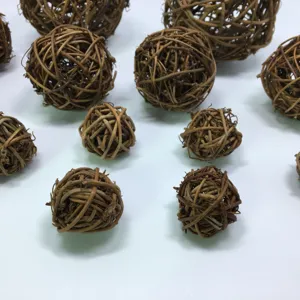 Detailed view of natural woven rattan vine balls, perfect for floral arrangement and holiday decor.