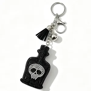 Strass Totenkopf Parfümflasche Schlüsselanhänger mit schwarzem Quasten Taschen Anhänger.