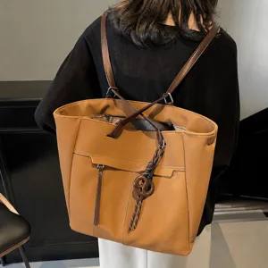 Women's large capacity vintage tote bag casual commuting convertible backpack main view.