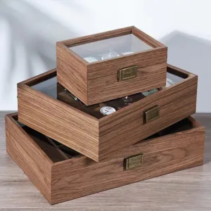 Wooden watch storage box with glass lid and vintage metal clasp for multiple wristwatches display