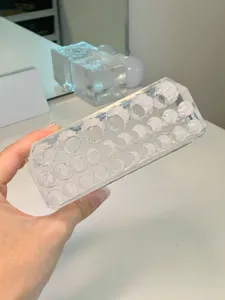 Clear 26-hole makeup brush holder detail view, showing transparent acrylic cosmetic organizer.