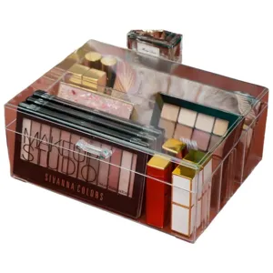 Transparenter Kosmetik Organizer aus Kunststoff mit Deckel und Schubladen für Make-up.