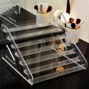 Organizador de maquillaje de acrílico transparente de varios niveles para sombras y labiales.