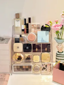 Clear acrylic tiered makeup organizer for lipstick, eyeshadow palette and cosmetics storage desk
