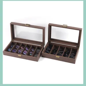Caja de almacenamiento de gafas de madera con tapa de cristal para organizar gafas de sol.