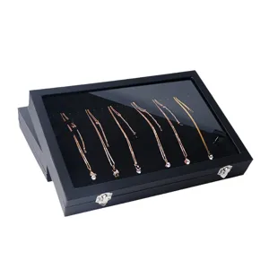 Black velvet jewelry display box necklace organizer with clear glass lid for store counter.