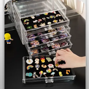 Transparent acrylic badge storage box multi-layer drawer design dustproof pin organizer.