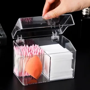 Clear acrylic cotton swab and cosmetic pad organizer box with convenient dustproof flip lid design.