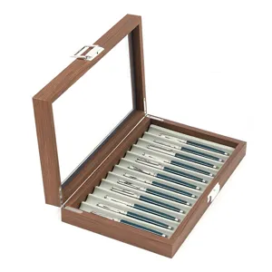 Zwarte walnoothouten vulpen display opbergdoos met glazen venster en fluwelen interieur.