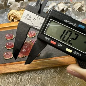 Cherry red strawberry quartz Pixiu charm pendant, precision size measurement display.