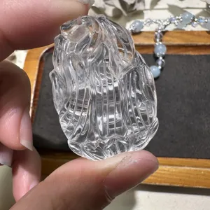 Hand-carved natural white crystal fox pendant detail, exquisite craftsmanship and clear texture.