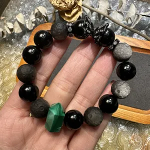 Black obsidian and silver obsidian gemstone bracelet with malachite column and crystal butterfly.