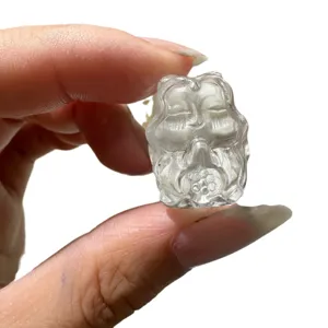 Natural white crystal carved face bead pendant for DIY bracelet jewelry making accessory.