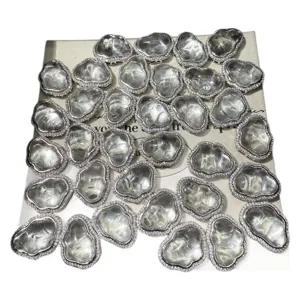 Cloud shape crystal pendants with sparkly pave borders, perfect for DIY jewelry making.