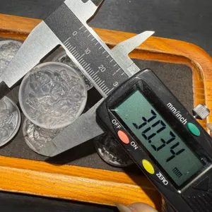 Natural crystal carved round pendant DIY accessory showing precise size measurement detail.