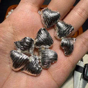 Silver heart spacer beads for DIY jewelry making, vintage brushed metal charm set.