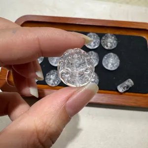 Natural clear white crystal small carved gemstone pendant detail view for jewelry making