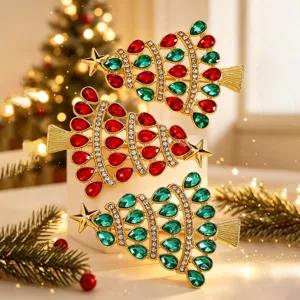 Christmas tree rhinestone brooch pin detail view, festive red green crystal jewelry accessory.