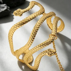 Bracciale serpente oro polsino multistrato con catena e nappa gioiello corpo donna