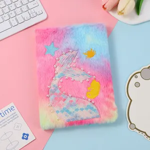 Cute plush mermaid tail notebook detail, colorful fuzzy diary perfect for students.