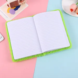Green plush notebook open detail showing lined pages, cute fluffy cover design for student writing.