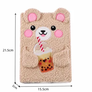 Cute plush bear notebook with boba tea design, soft furry cover, ideal diary and planner for kids.