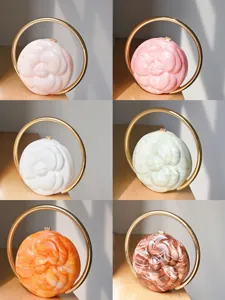 Camellia embossed round evening bag with gold metal ring handle acrylic marbled clutch purse