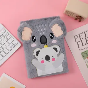 Cute grey koala plush notebook detail view, soft cover children diary and cute writing pad.