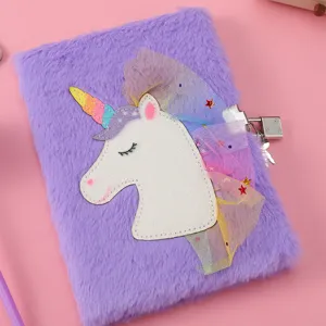 Plush unicorn notebook detail shot, featuring soft purple faux fur cover and cute mesh mane.