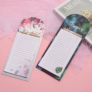 Magnetic notepad with lined paper and wooden pencil, cute floral and tropical design.