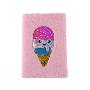 Close-up of pink fluffy notebook cover featuring a cute holographic ice cream patch design.