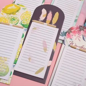 Detailed view of colorful creative student memo pads and sticky notes with cute design.