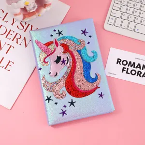 Sparkly unicorn notebook with cute embroidered design and pink hardcover for kids and teens school.