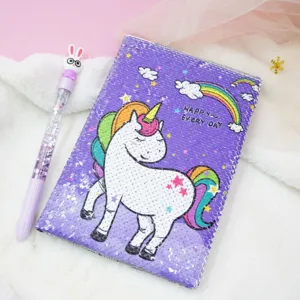 Purple sequin unicorn notebook with cute glitter pen set, ideal for school and daily journaling.