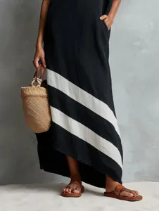 Cotton linen asymmetrical striped maxi dress detail showcasing stylish color block design.