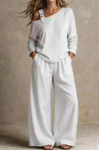Detailed showcase of women casual two piece set, featuring stylish one shoulder long top.