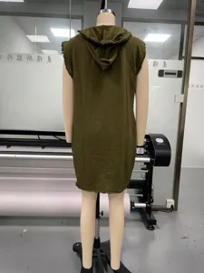 Green sleeveless hooded mini dress with raw edge detail, minimalist style for casual wear.