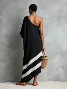 Black one-shoulder asymmetrical midi dress with striking white diagonal stripes for women.