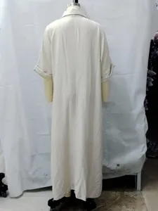 Minimalist solid color loose short sleeve dress detail back view, casual elegant daily wear.