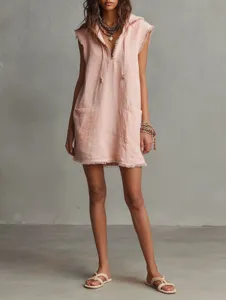 Detailed view of pink sleeveless hooded mini dress with raw edges and pockets for women.